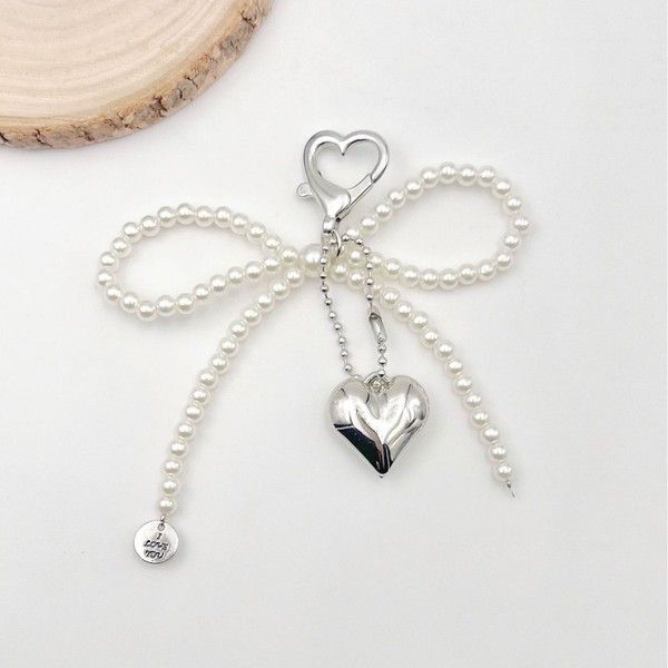 Bow pearl charms
