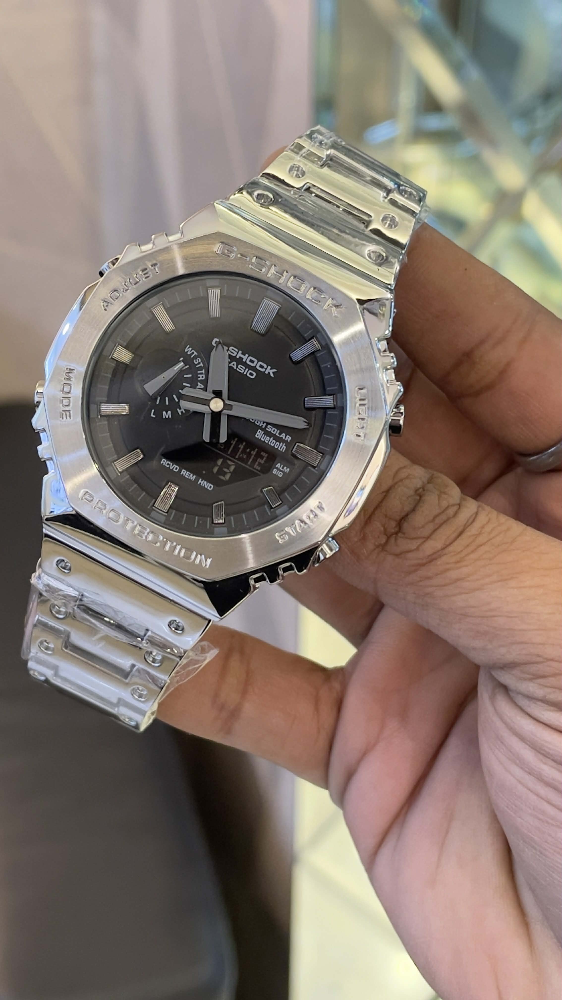 Casio G-Shock GM-B2100D-1A Silver Chain Black Dial