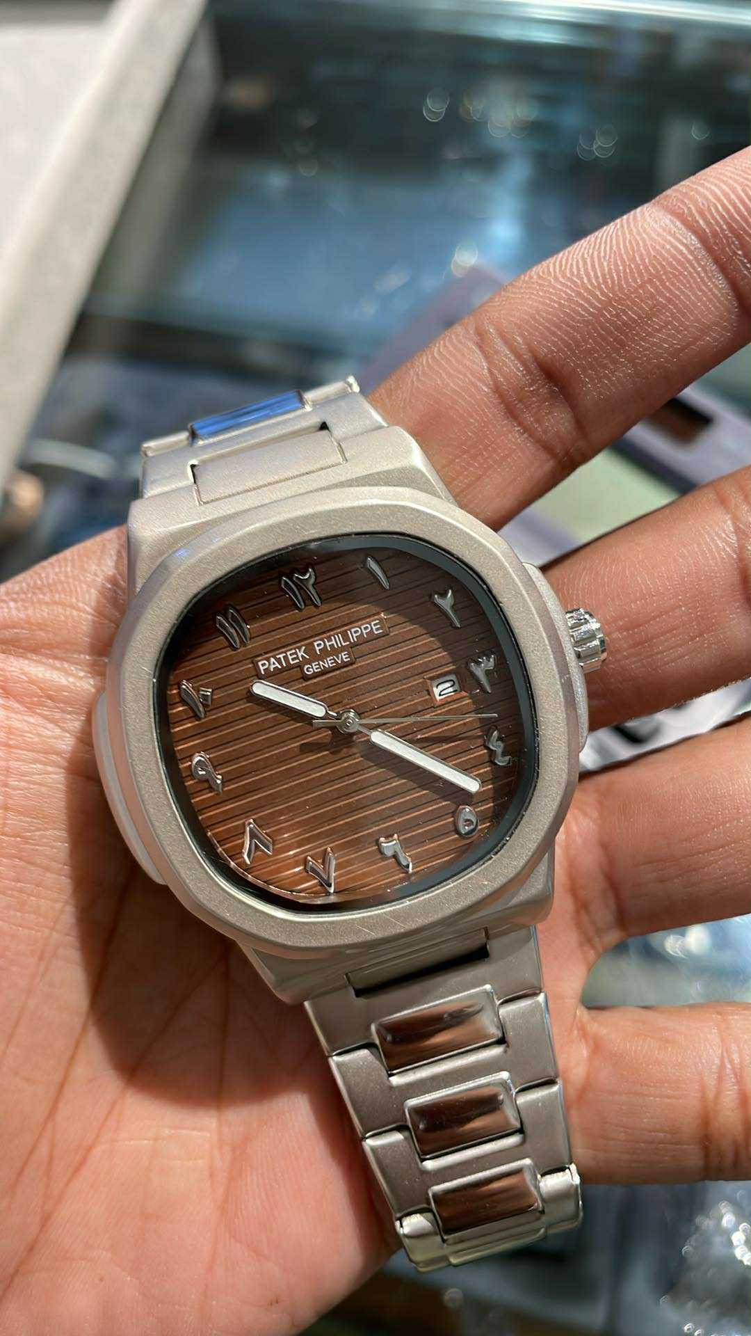 PATEK arabic aura brown dial