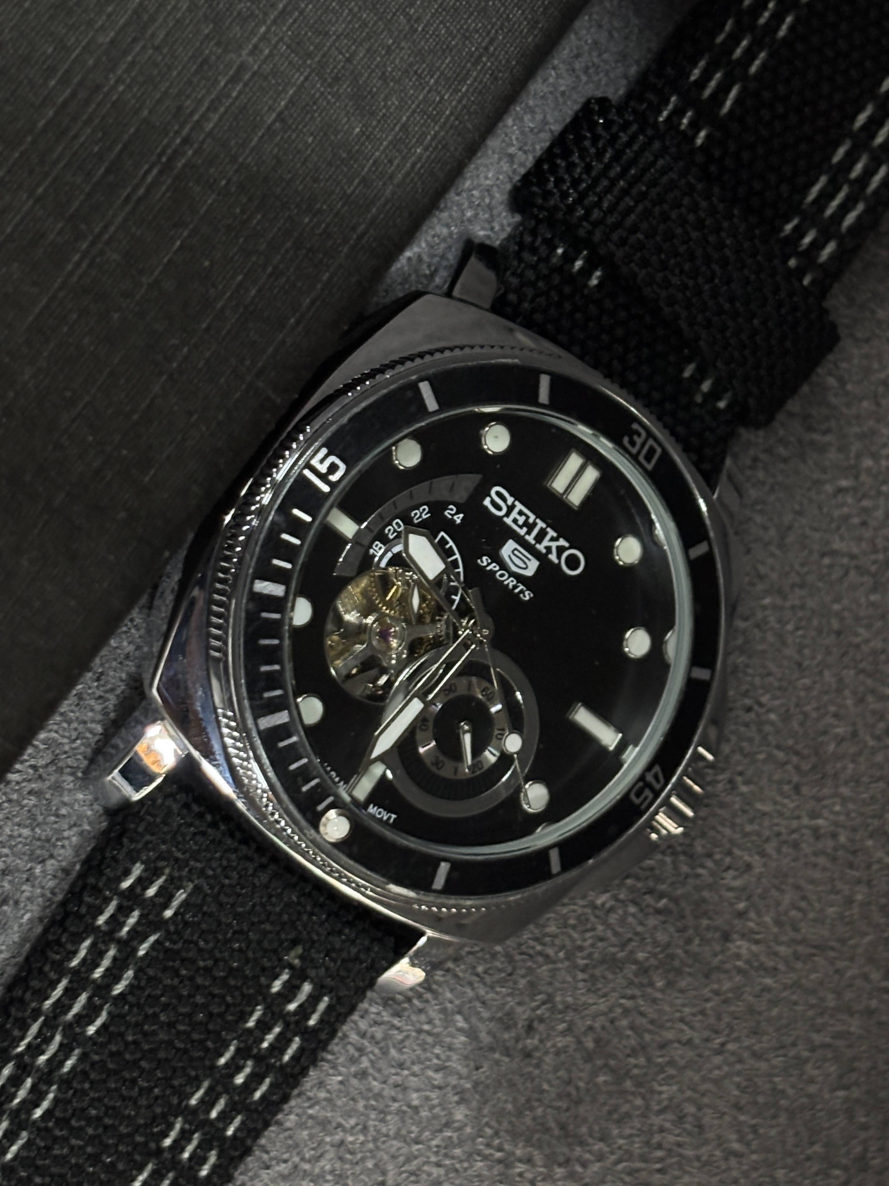 (AAA) copy Seiko 5 Sports automatic watch with a black dial and a black nylon strap