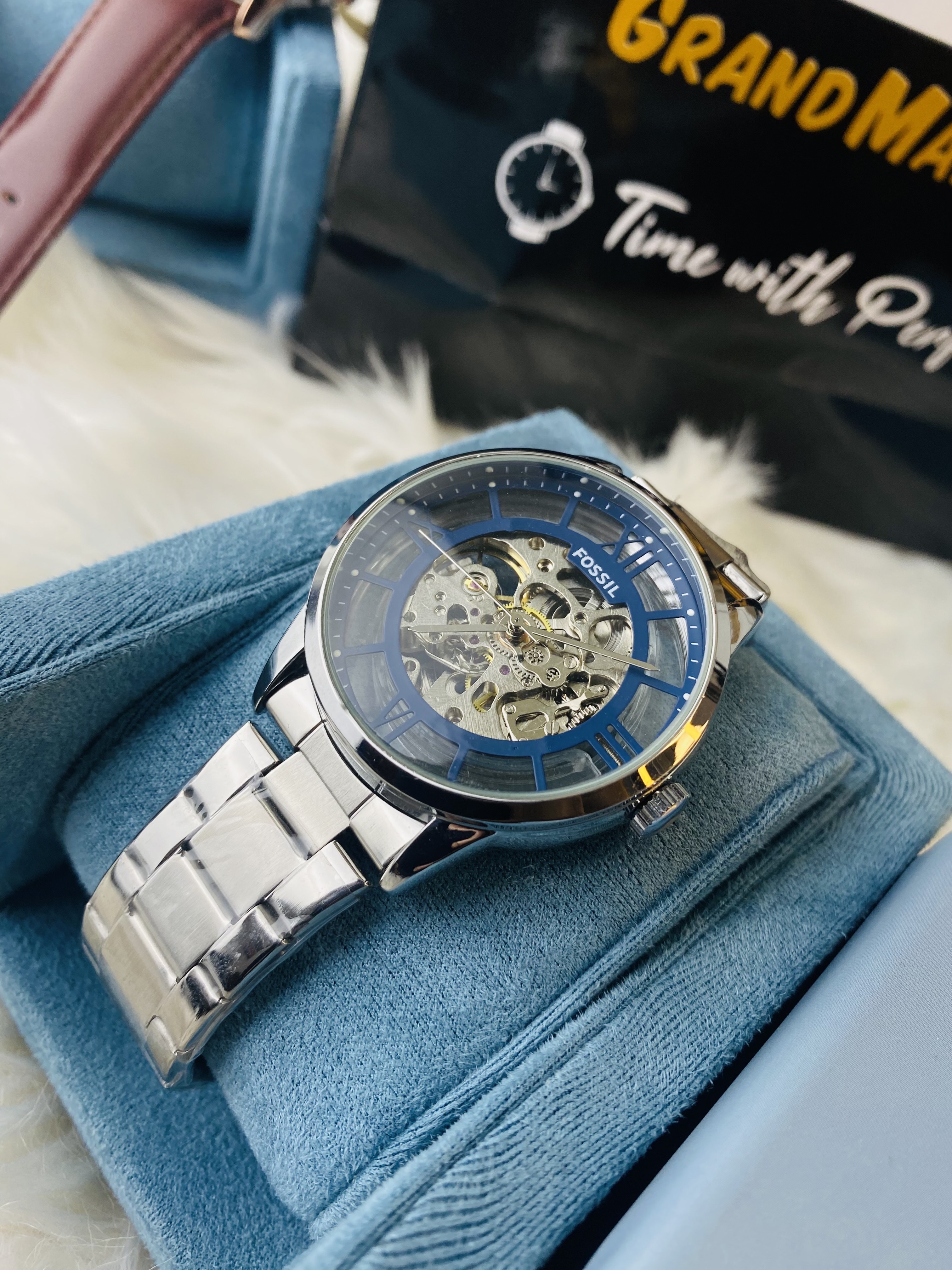 FOSSIL AUTOMATIC SKELETON SILVER CHAIN UPER BLUE