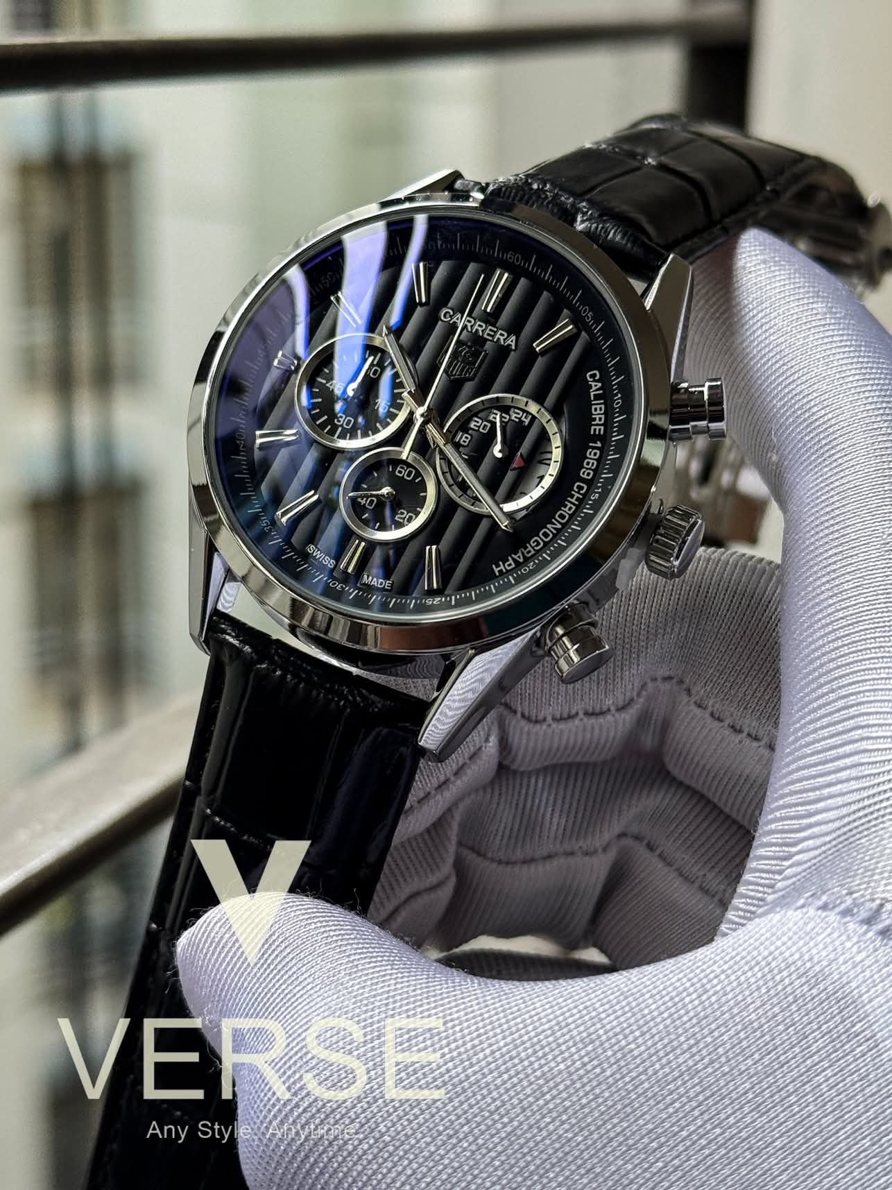 Tag chain 1969 black dial silver case black belt