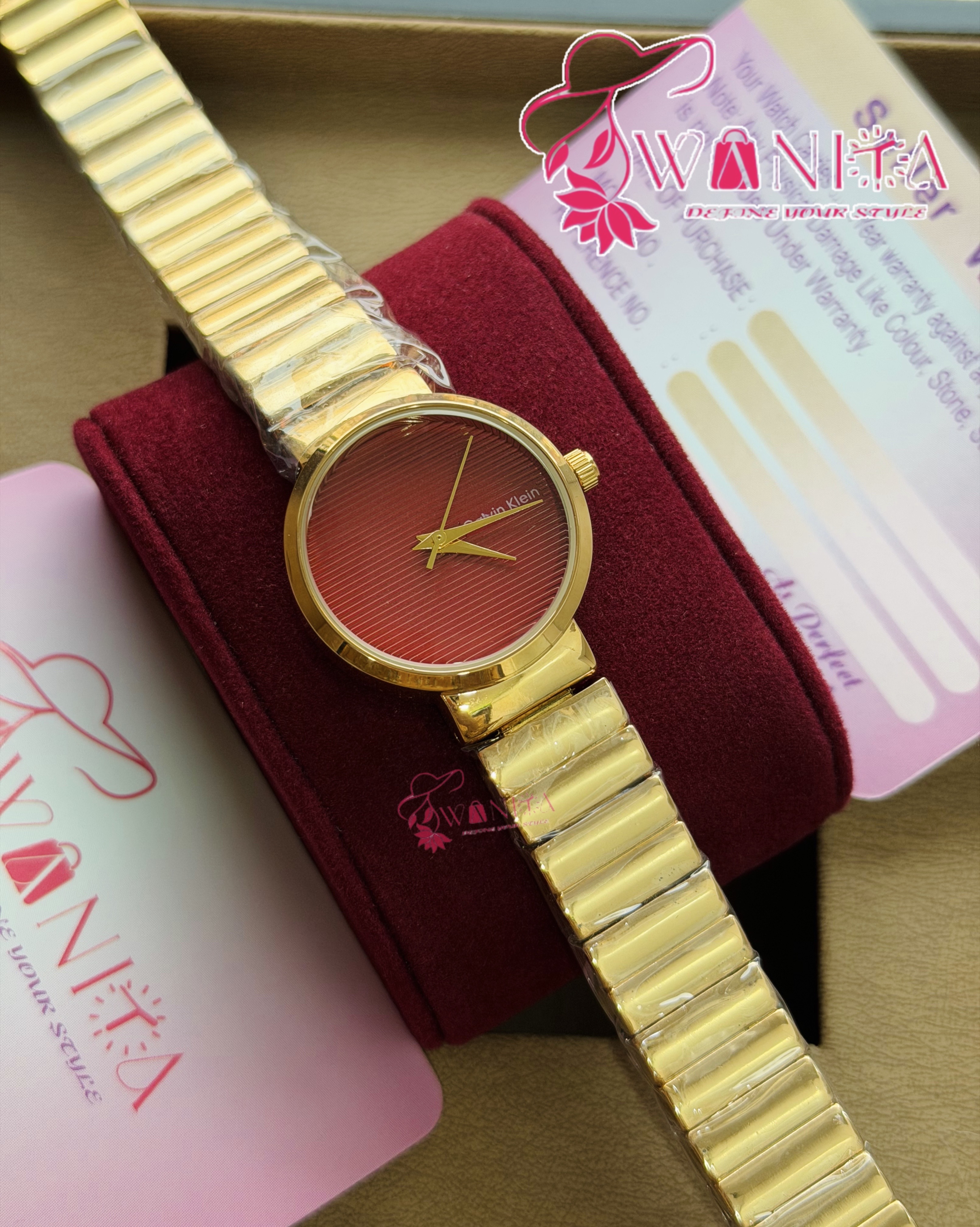 CALVIN KLEIN LADIES WINE DIAL WATCH