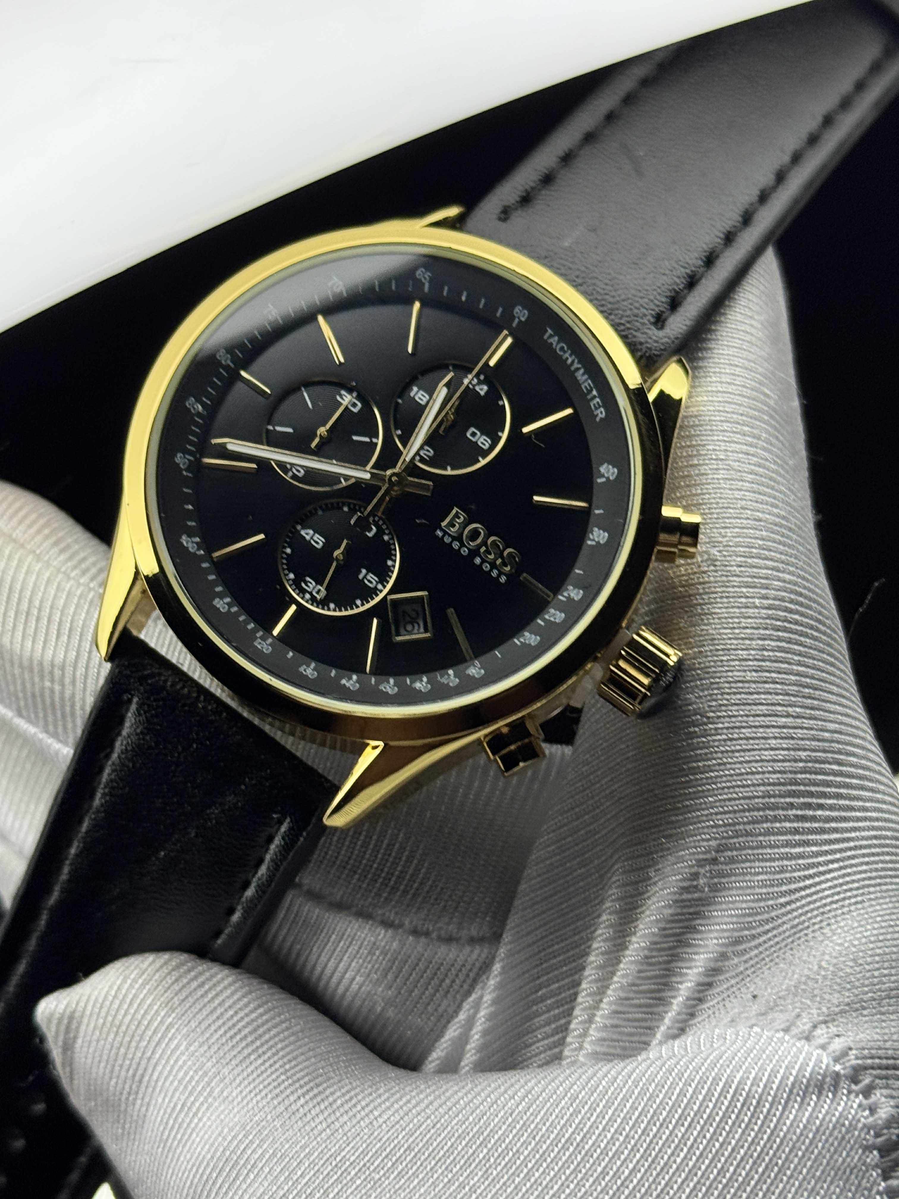 Boss three chrono gold case black dial