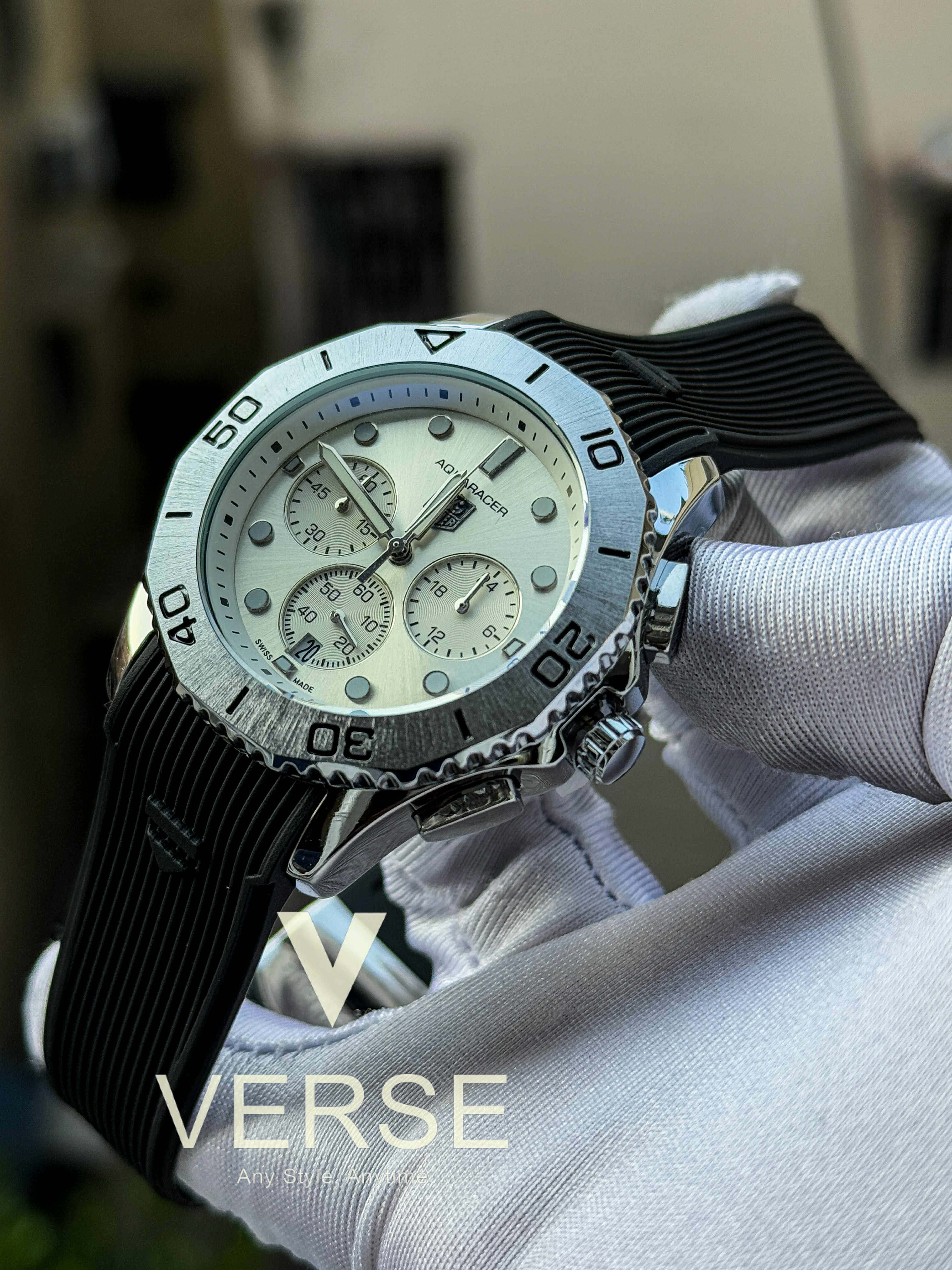 Taghuer aquaracer black belt white dial