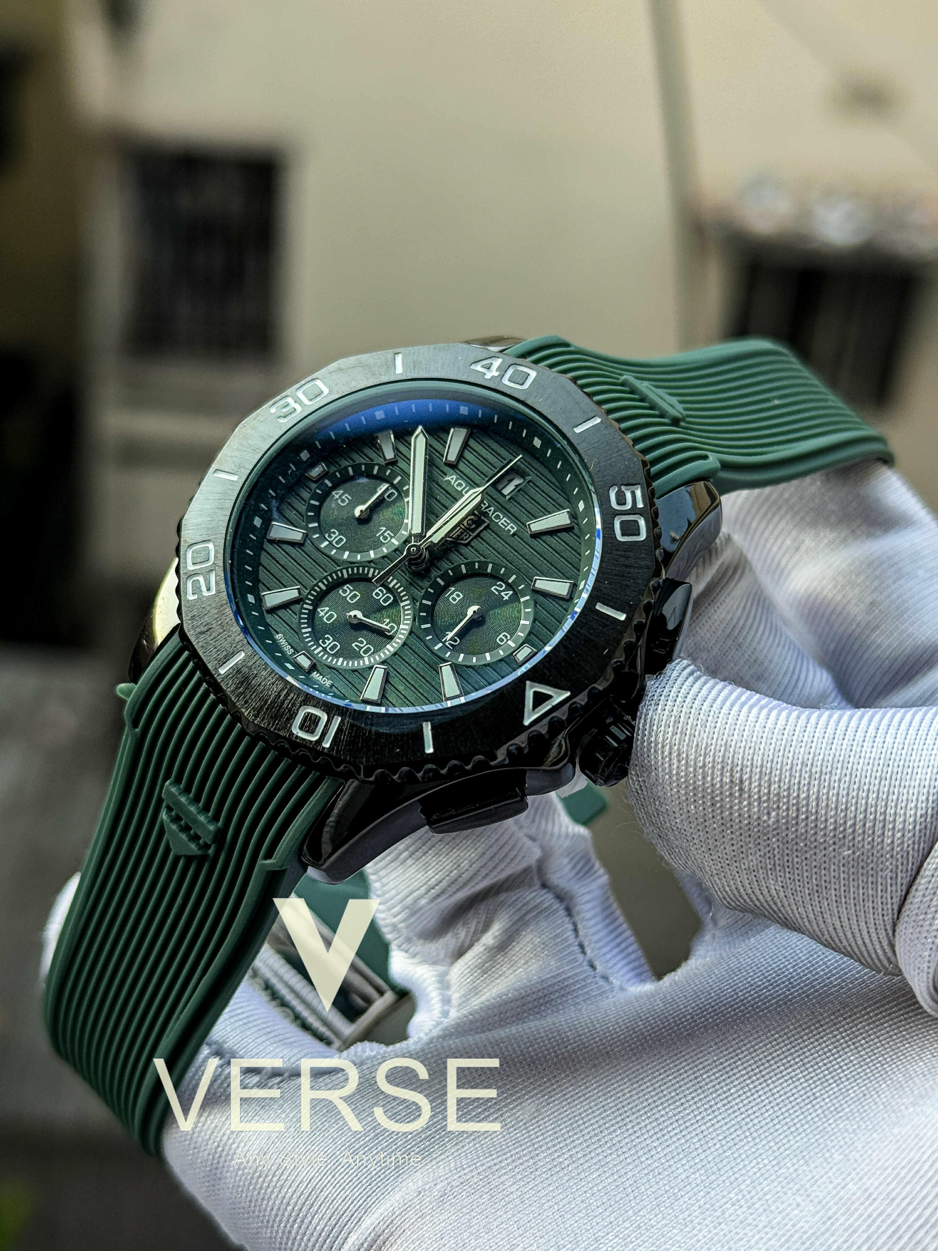 Taghuer aquaracer green belt black case strip dial