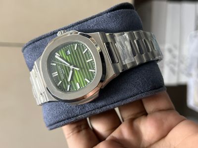 PATEK QUARTZ SILVER CASE OLIVE DIAL OFFER_img_0