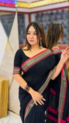 Elegant Black and Red Handloom Saree with Intricate Geometric Border_img_0