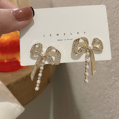 Twist metal bow drop earring_img_3