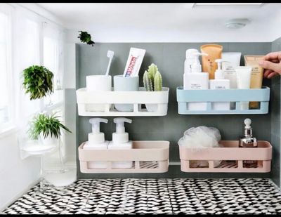 multipurpose plastic organizer racks commonly used in bathrooms, kitchens, or offices._img_0