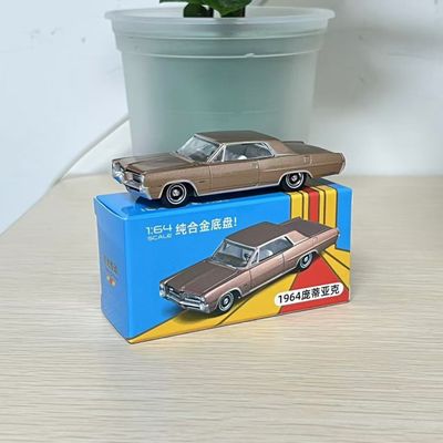 1964 Pontiac Grand Prix Golden Diecast Model Car_img_0