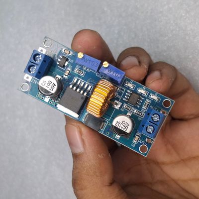 XL4015 DC-DC step-down buck converter module. This type of module is used to convert a higher DC voltage to a lower, adjustable DC voltage._img_2