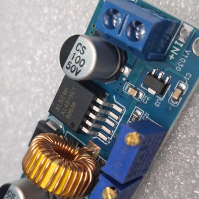 XL4015 DC-DC step-down buck converter module. This type of module is used to convert a higher DC voltage to a lower, adjustable DC voltage._img_4