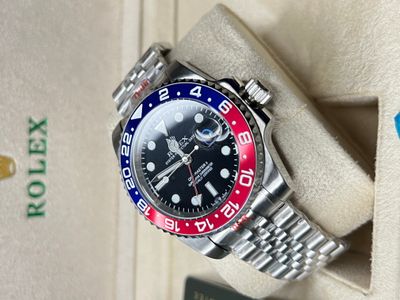 AAA  Rolex GMT-Master II Pepsi 126710BLRO – 40 mm Stainless Steel, Black Dial, Red & Blue Bezel_img_0