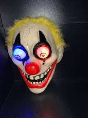 LED  New Halloween Mask Scary Red Nosed Clown Mask with Funny Terrifying Gripping Electric Saw Murderer Mask_img_4