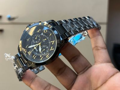 FOSSIL QUARTZ ARABIC FULL BLACK GOLDEN DIGITS_img_0