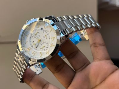 FOSSIL QUARTZ ARABIC WHITE DIAL SILVER CASE GOLDEN DIGITS_img_0