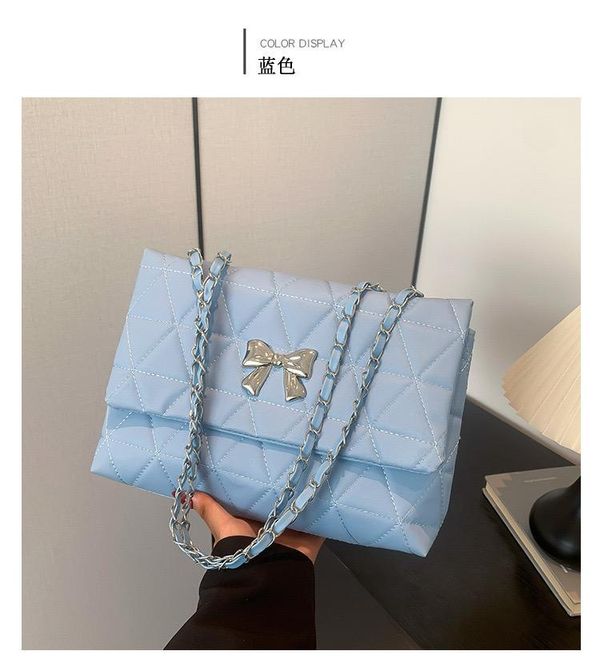 Fashion Tempertment Bow Shoulder Popular BagSize: 22*14*7.5 CmMaterial: PUBrand New - High Quality