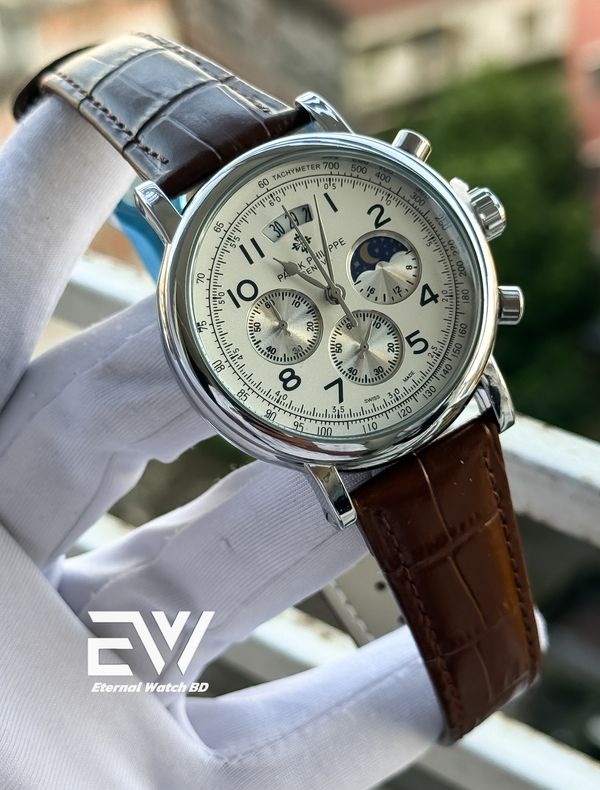 PATEK PHILLIPE S WHITE DIAL BROWN BELT SILVER CASE