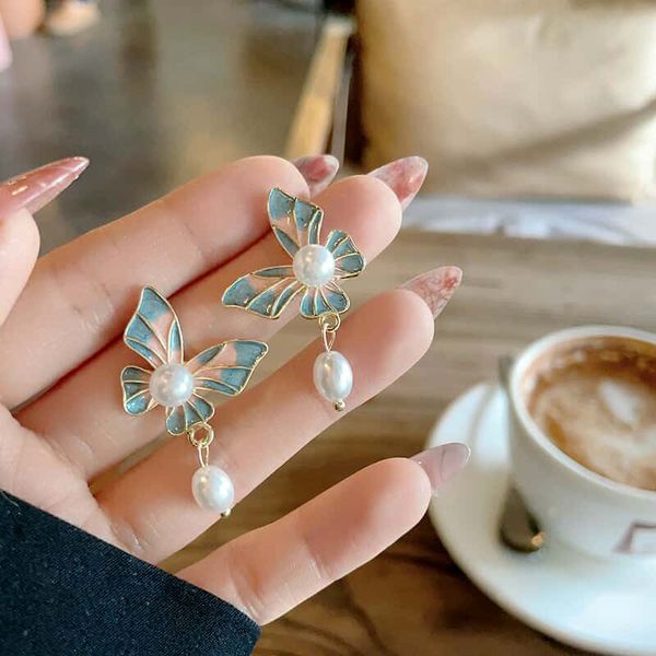 Pink blue enamel butterfly drop earring