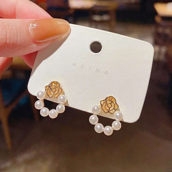 Vantage Pearl rose earrings