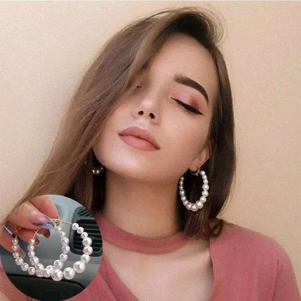 Oversize parl earrings round