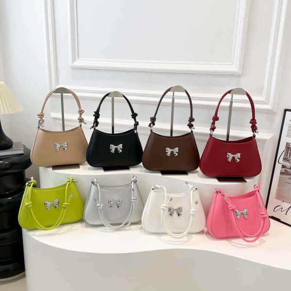 Silver Bow knotted strap hand bag👜