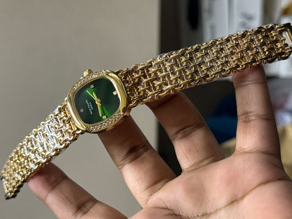 PATEK PHILIPPE STONE CASE GOLD GREEN DIAL