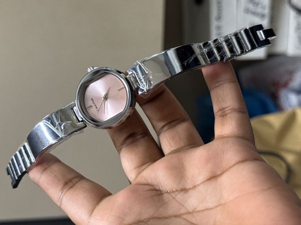 CALVIN KLEIN SILVER CASE PINK DIAL