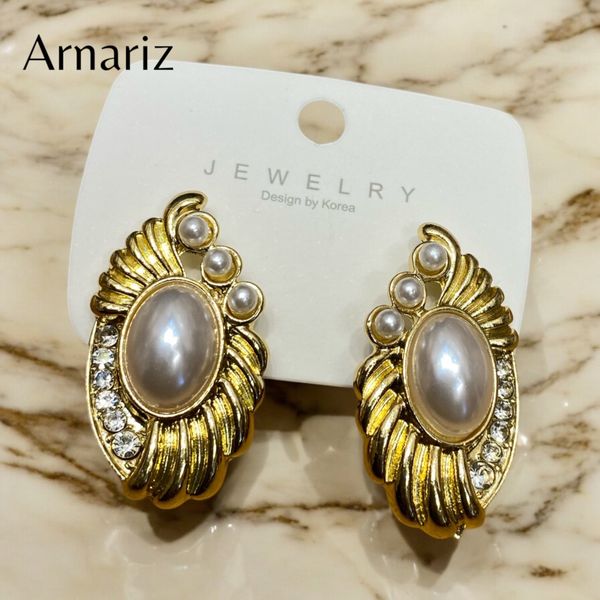 Gold-tone top 19