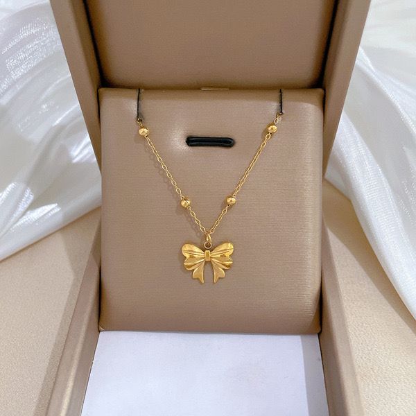Bow/pookie neckpiece
