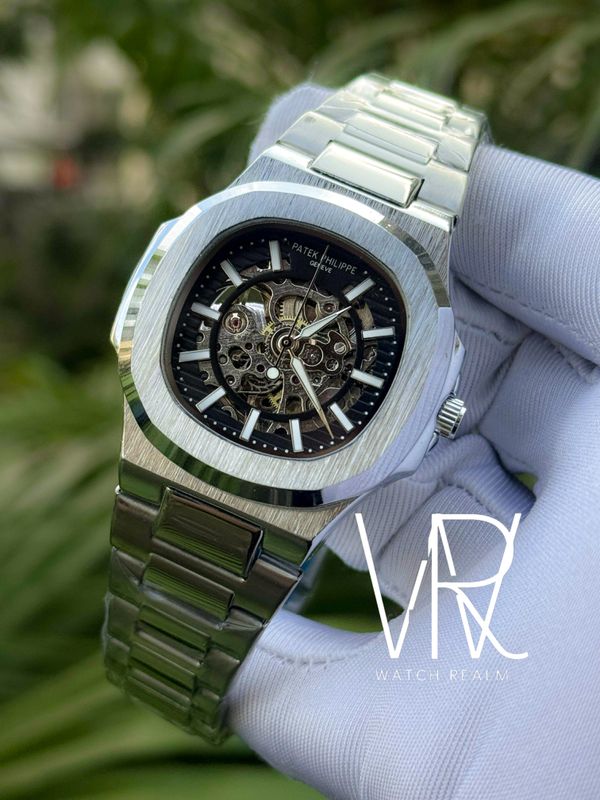 PATEK AUTO CHAIN SKELETON BLACK DIAL