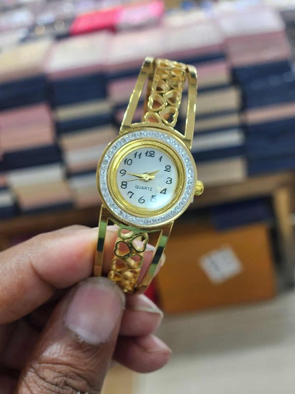 Gold Clovie Crystal Studded Cuff Bracelet Style Watch