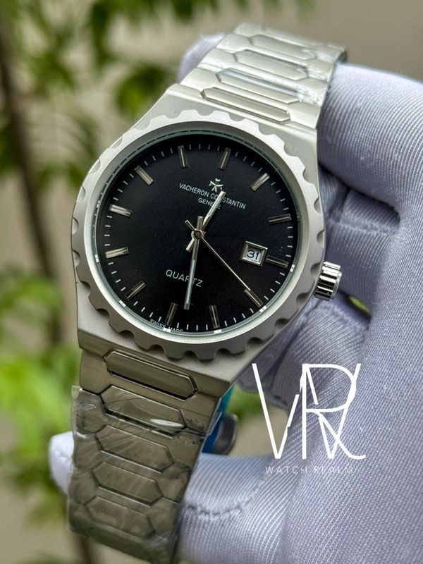 VACHERON CONSTANTIN QUARTZ SILVER CHAIN BLACK DIAL
