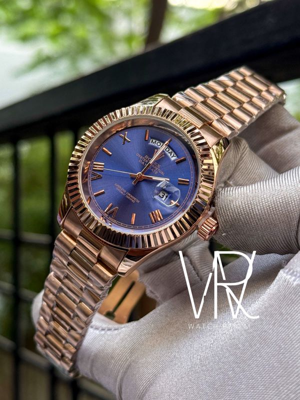 ROLEX DAYDATE RG CHAIN BLUE DIAL