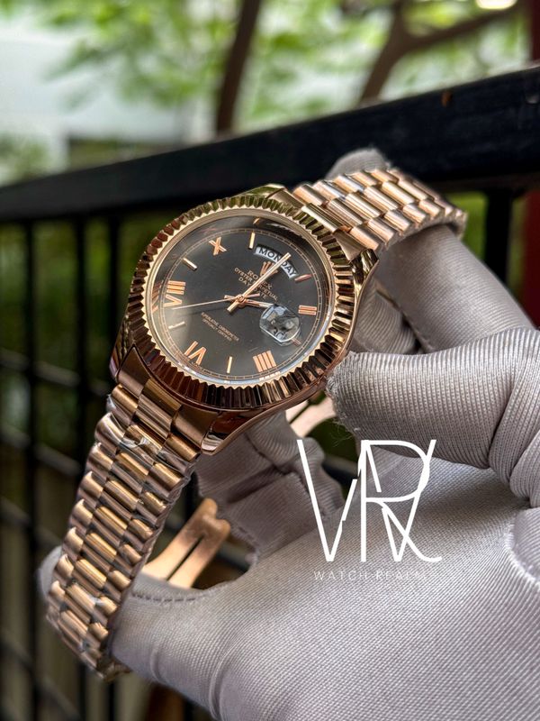 ROLEX DAYDATE RG CHAIN BLACK DIAL