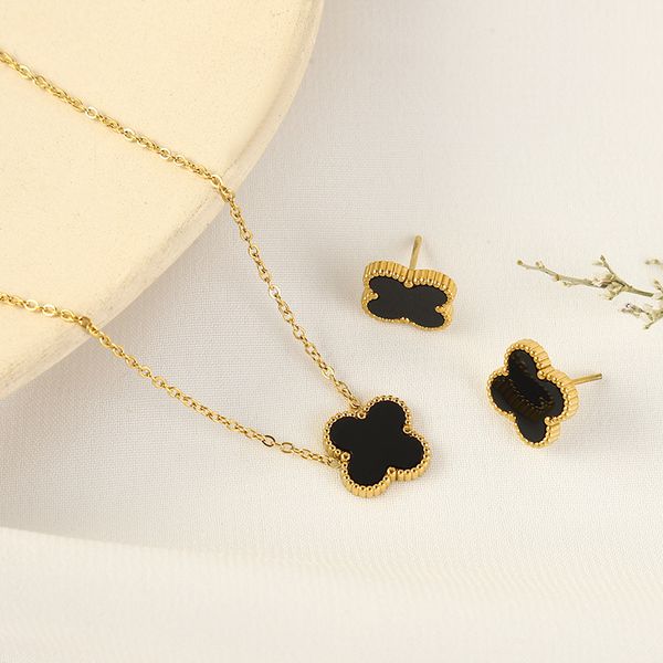 Four leaf locket with earring