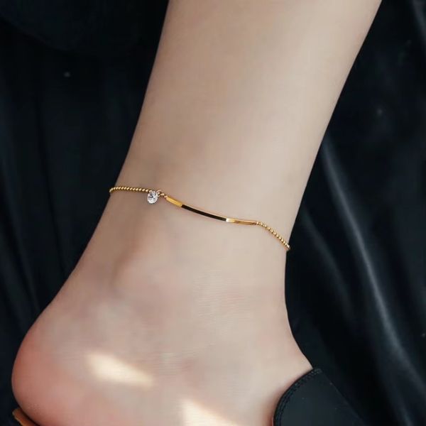Smiling zircon anklet