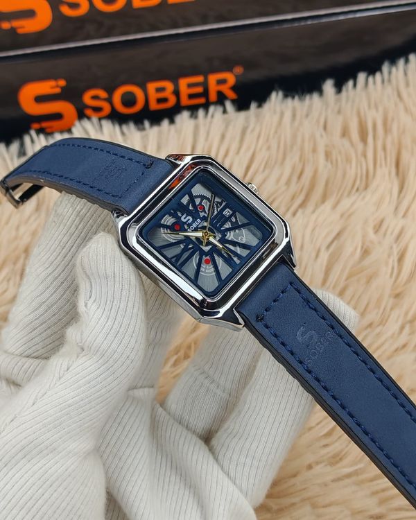 SOBER Wrist Watch with a square, skeleton dial and leather-look strap.