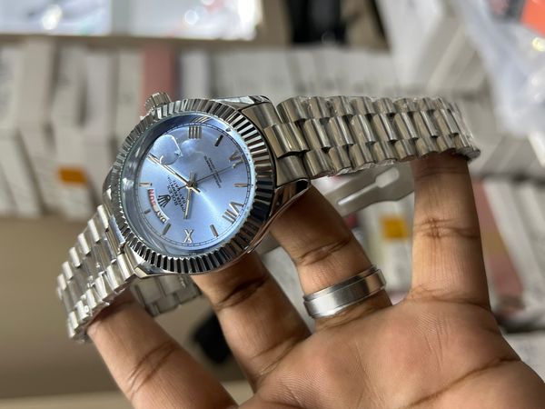 ROLEX DAY DATE SILVER - SKY