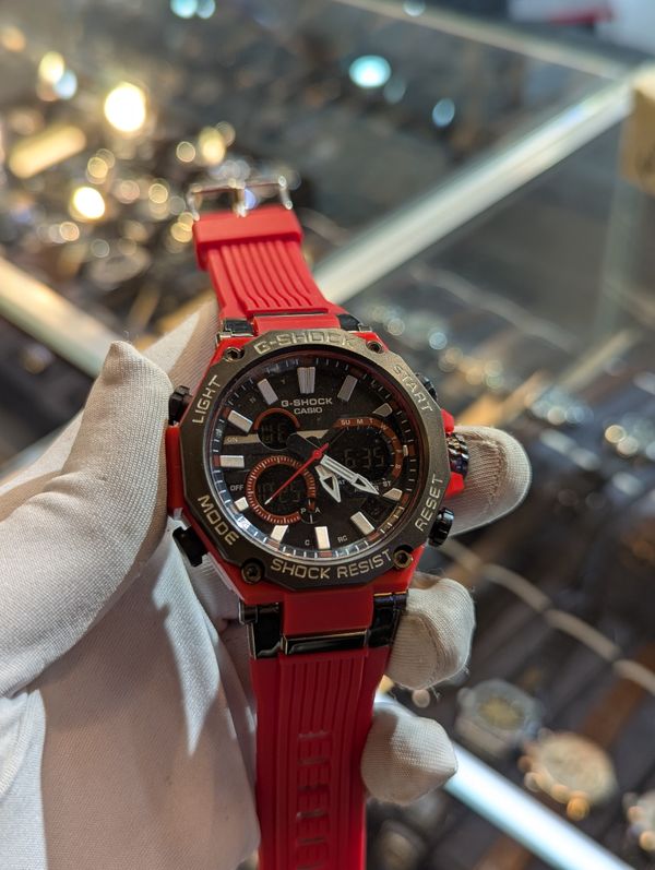 G Shock Bulky Red belt black bezel white dot
