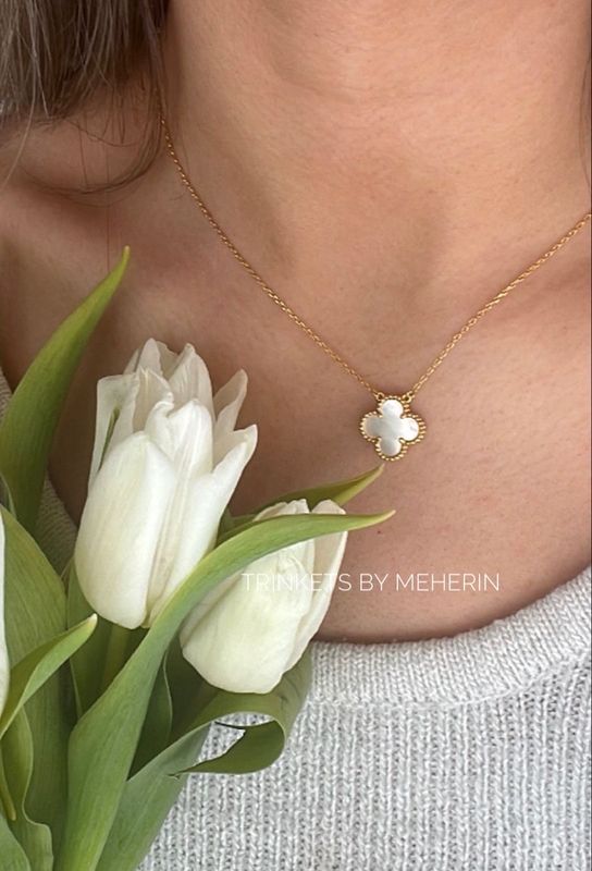 Double sided clover pendant