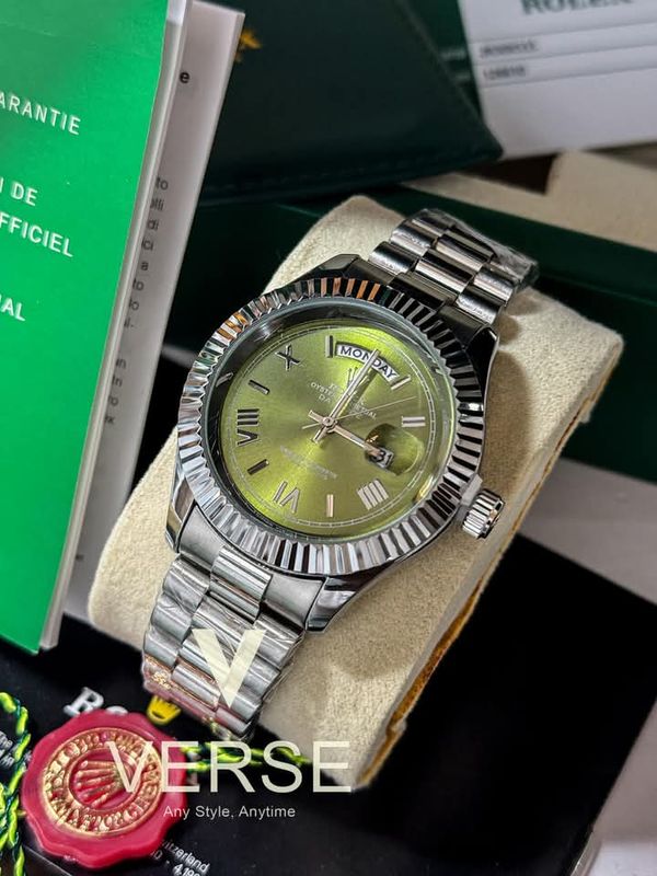 Rolex day date silver dial green