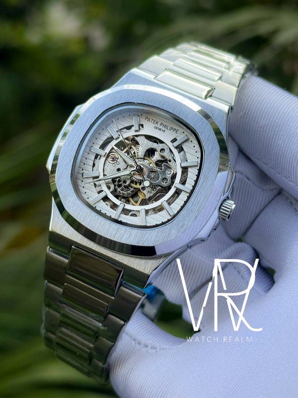 PATEK AUTO CHAIN SKELETON WHITE DIAL