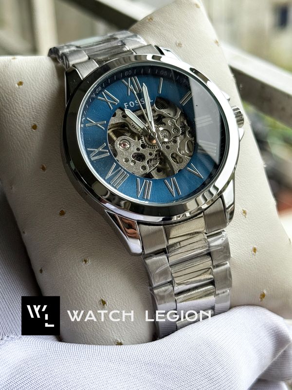 FOSSIL AUTO CHAIN BLUE DIAL