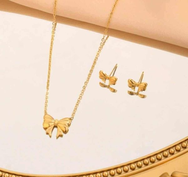 Stainless Steel Bow Pendent & Earrings Set ๐งก๐ฅ