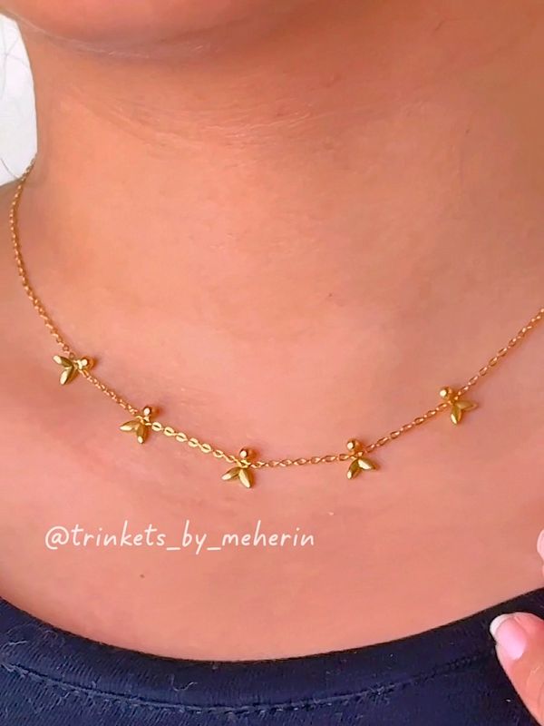 Fishtail charm neckpiece