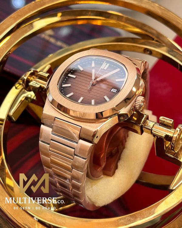 PATEK PHILIPPE NAUTILUS | EUROPEAN STANDARD | AUTOMATIC | ROSE GOLD CASE BROWN DIAL