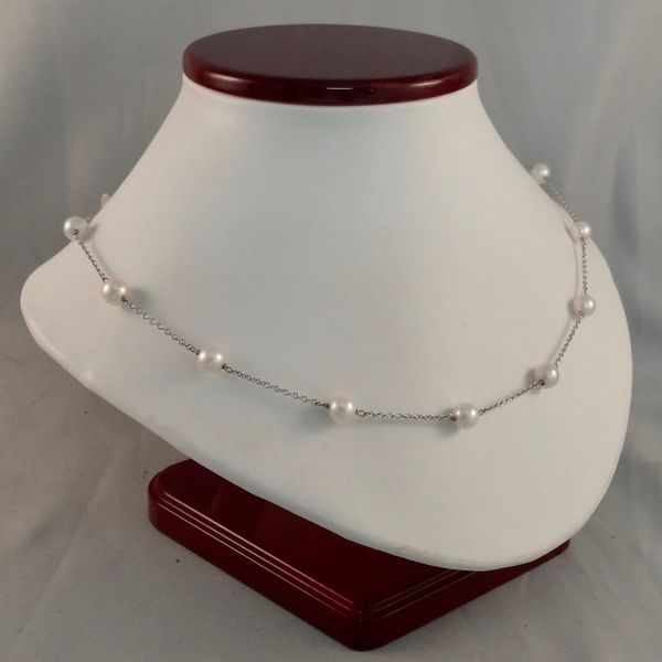 white pearl chain pendent.