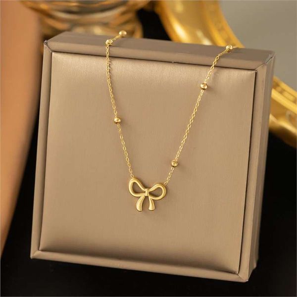 Bow pendents necklace